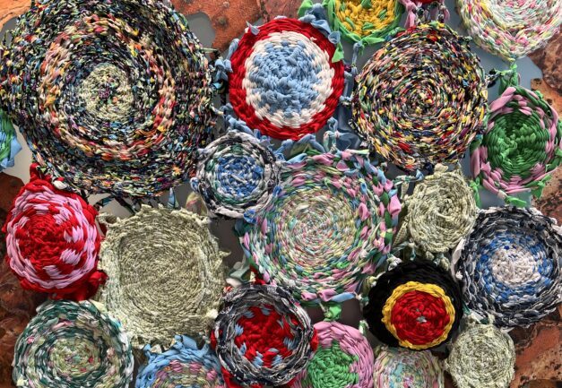 Photo of multicoloured woven objects.